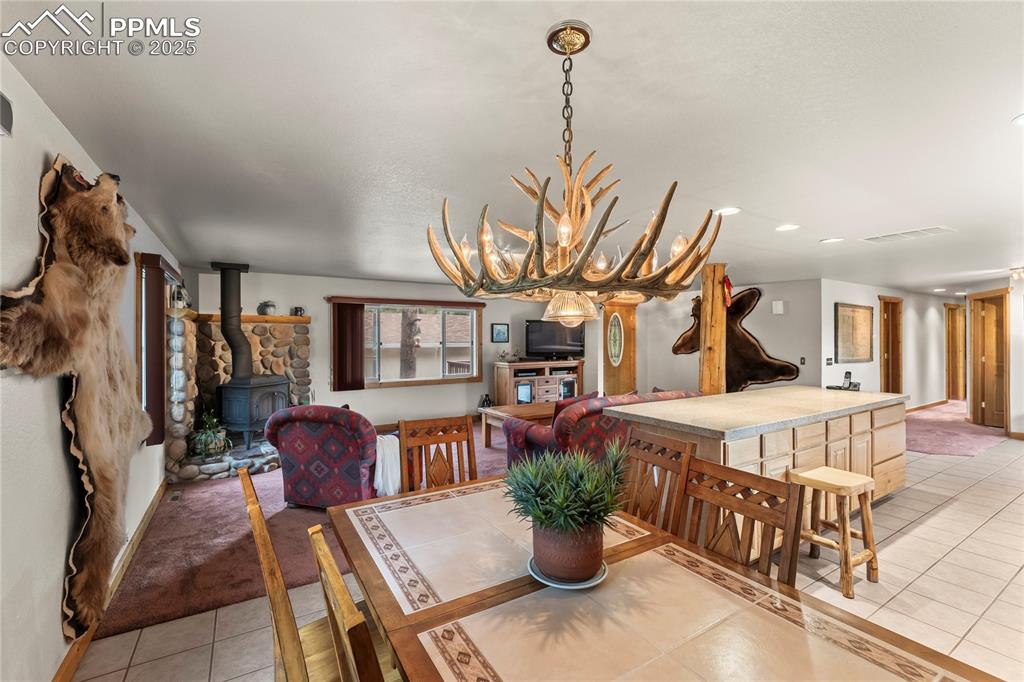 8025 Topeka Avenue Cascade, CO 80809 - Photo 22 of 42 a living room with furniture