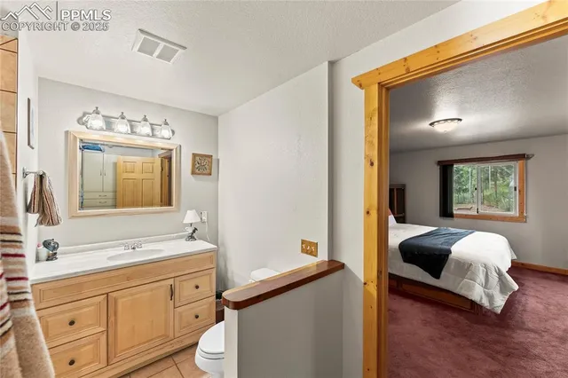 a bathroom with a bathtub and a sink