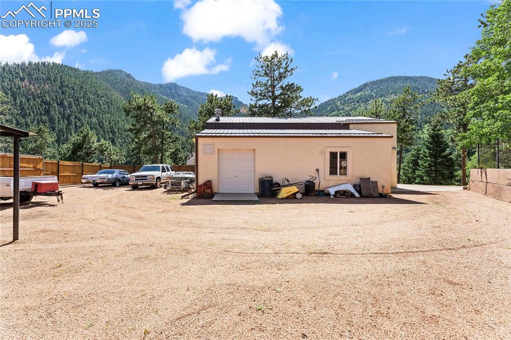 8025 Topeka Avenue Cascade, CO 80809 - Photo 7 of 42 a view of street with parked cars
