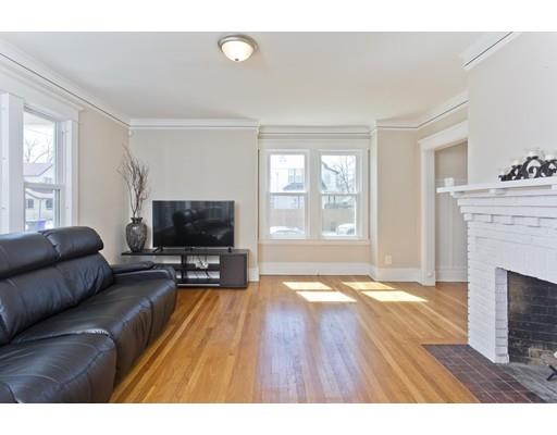 48 Sylvan Street Springfield, MA 01108 - Photo 6 of 28 a living room with furniture and a flat screen tv