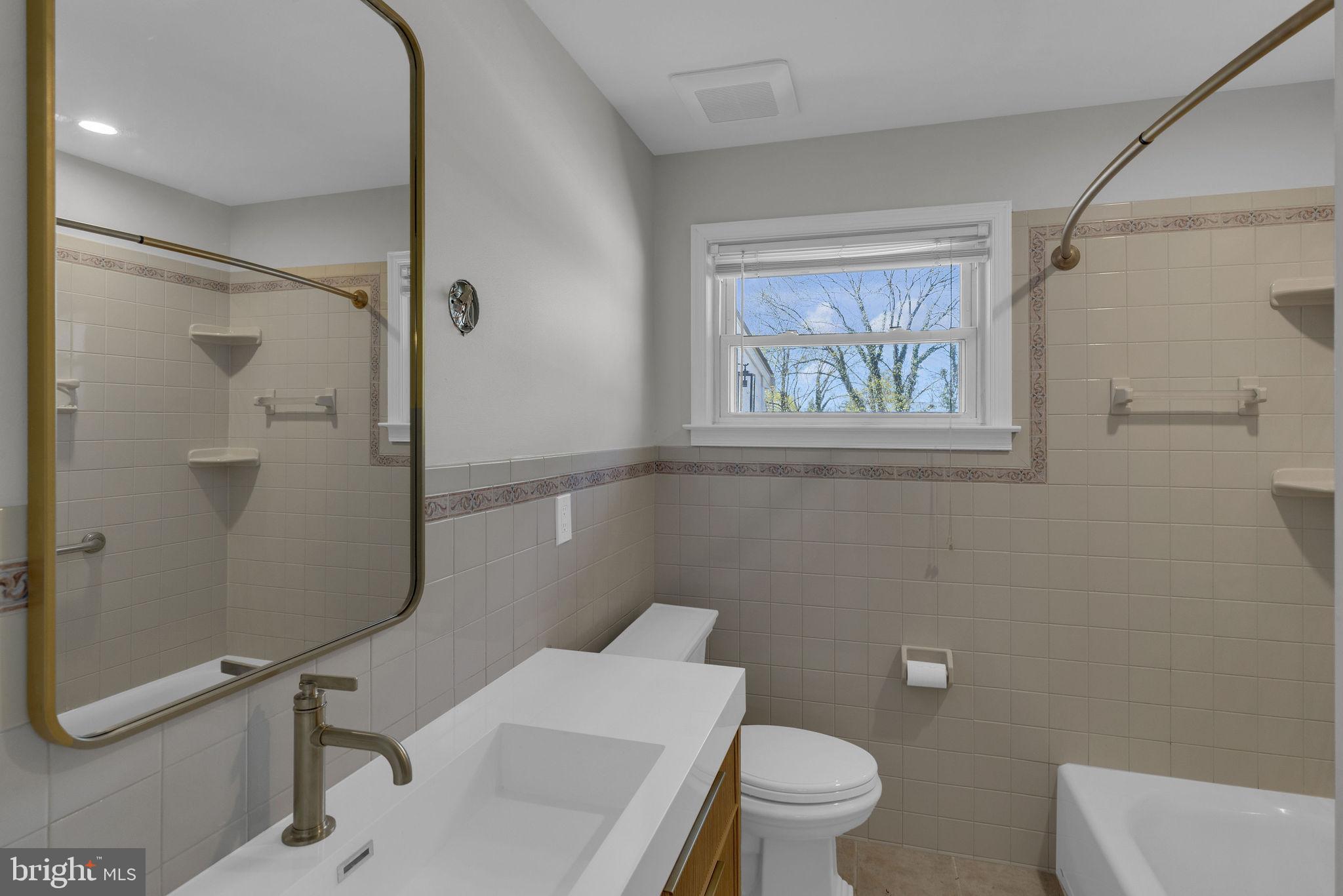 77 Davis Road Doylestown, PA 18901 - Photo 15 of 31 a bathroom with a toilet a sink and a shower