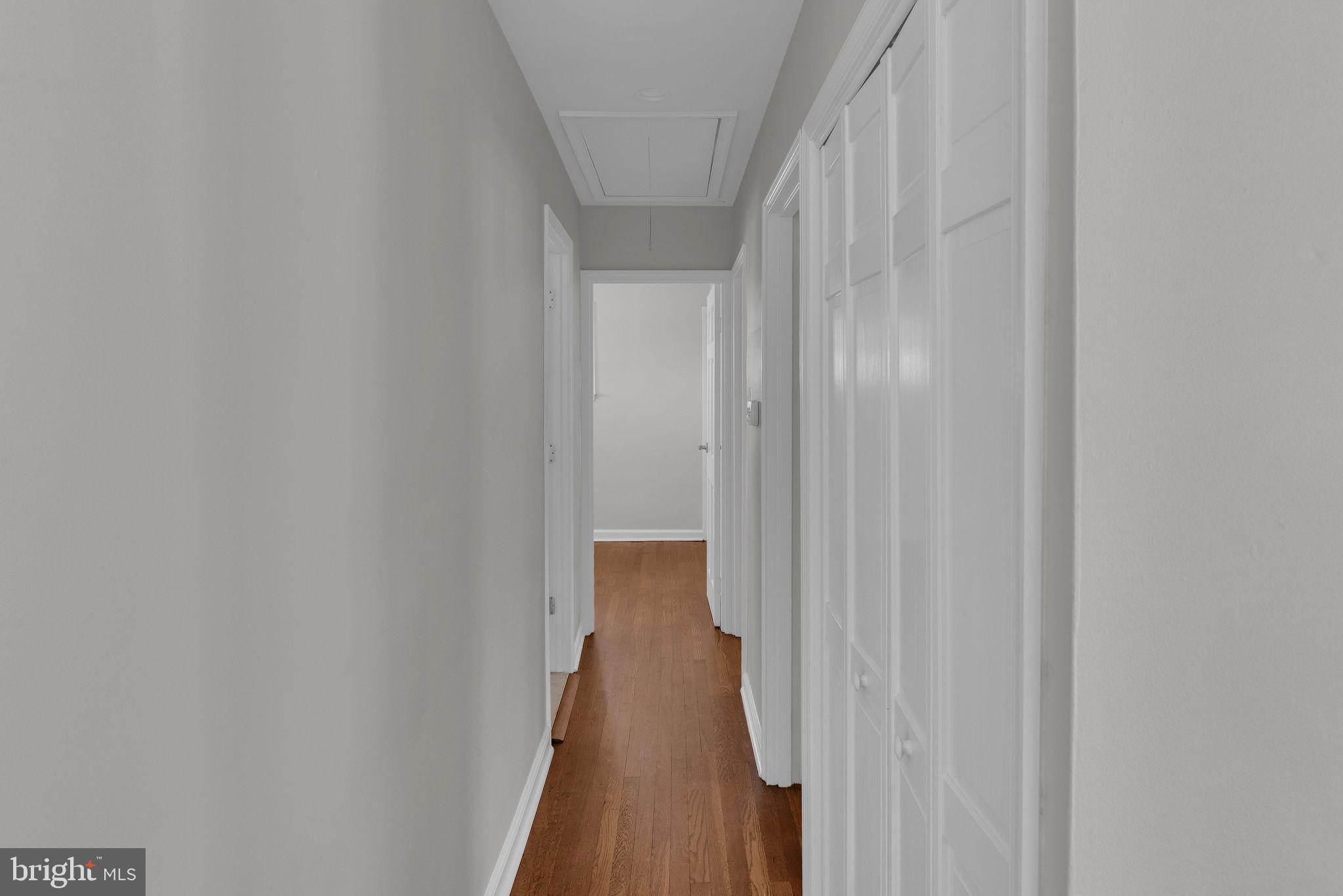 77 Davis Road Doylestown, PA 18901 - Photo 16 of 31 a view of a hallway with wooden floor