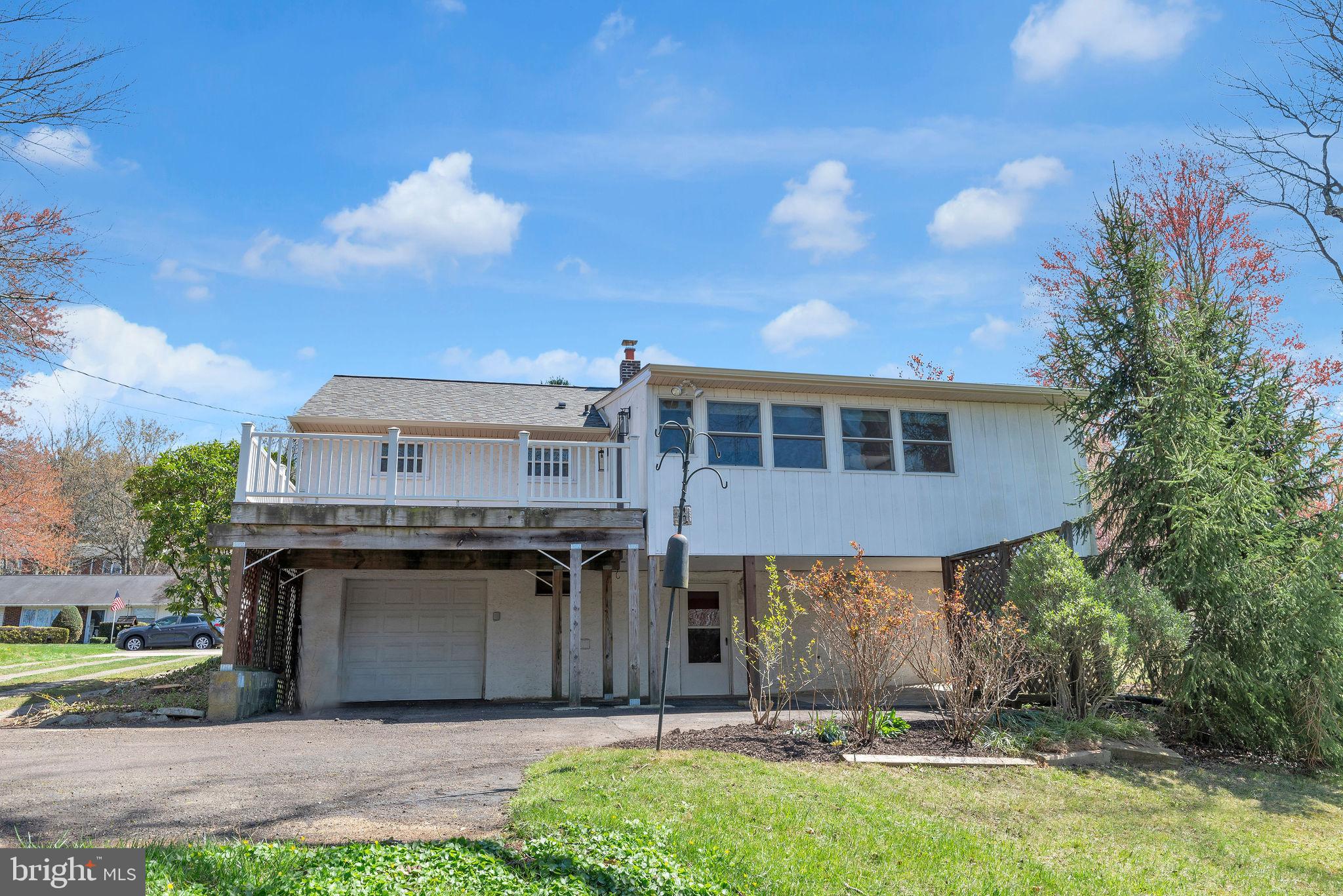 77 Davis Road Doylestown, PA 18901 - Photo 26 of 31 a view of a house with a yard and a large tree