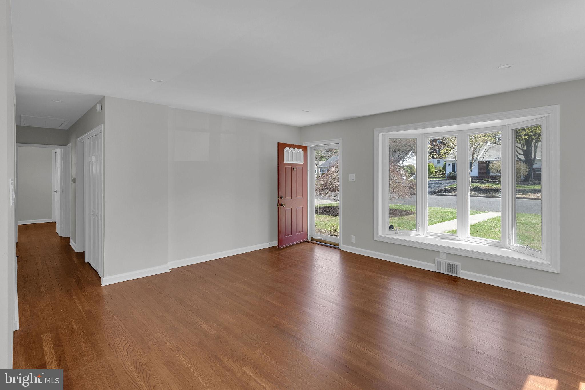 77 Davis Road Doylestown, PA 18901 - Photo 3 of 31 a view of room with window and wooden floor