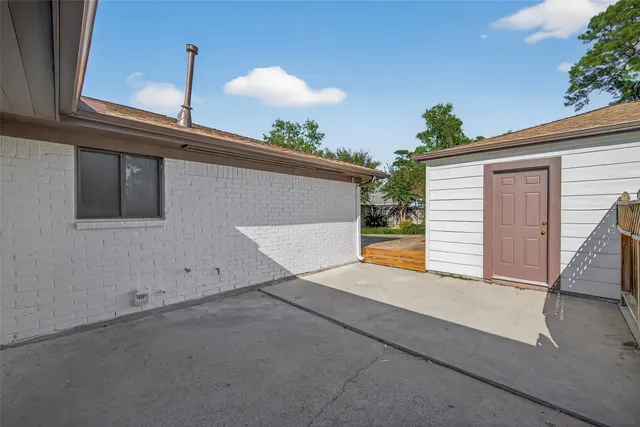 a view of backyard of house