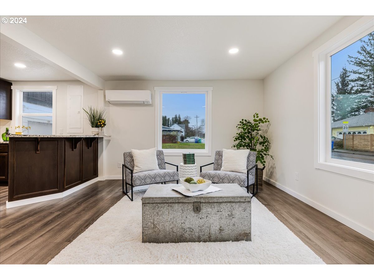 711 Southeast 5th Street Gresham, OR 97080 - Photo 11 of 44 a living room with furniture and a potted plant