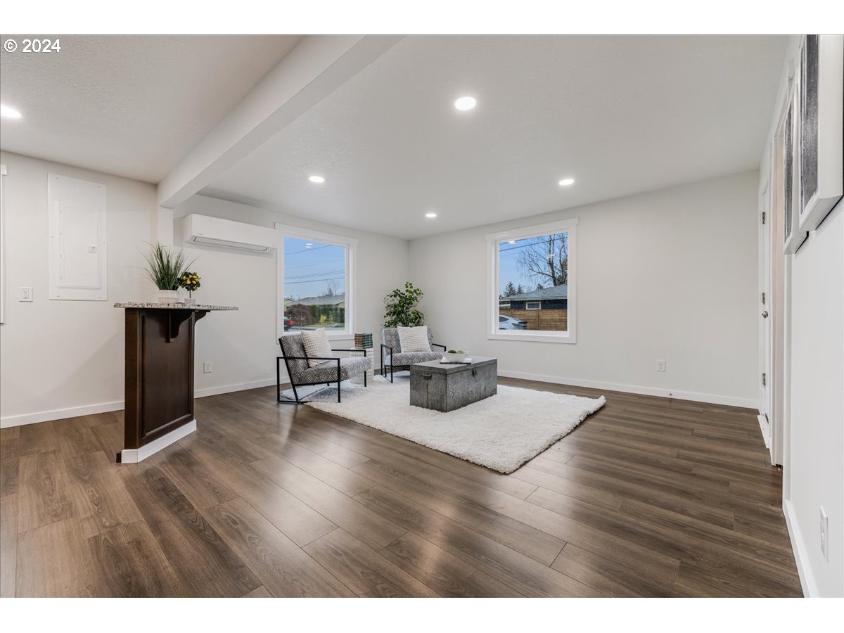 711 Southeast 5th Street Gresham, OR 97080 - Photo 15 of 44 a living room with furniture and wooden floor