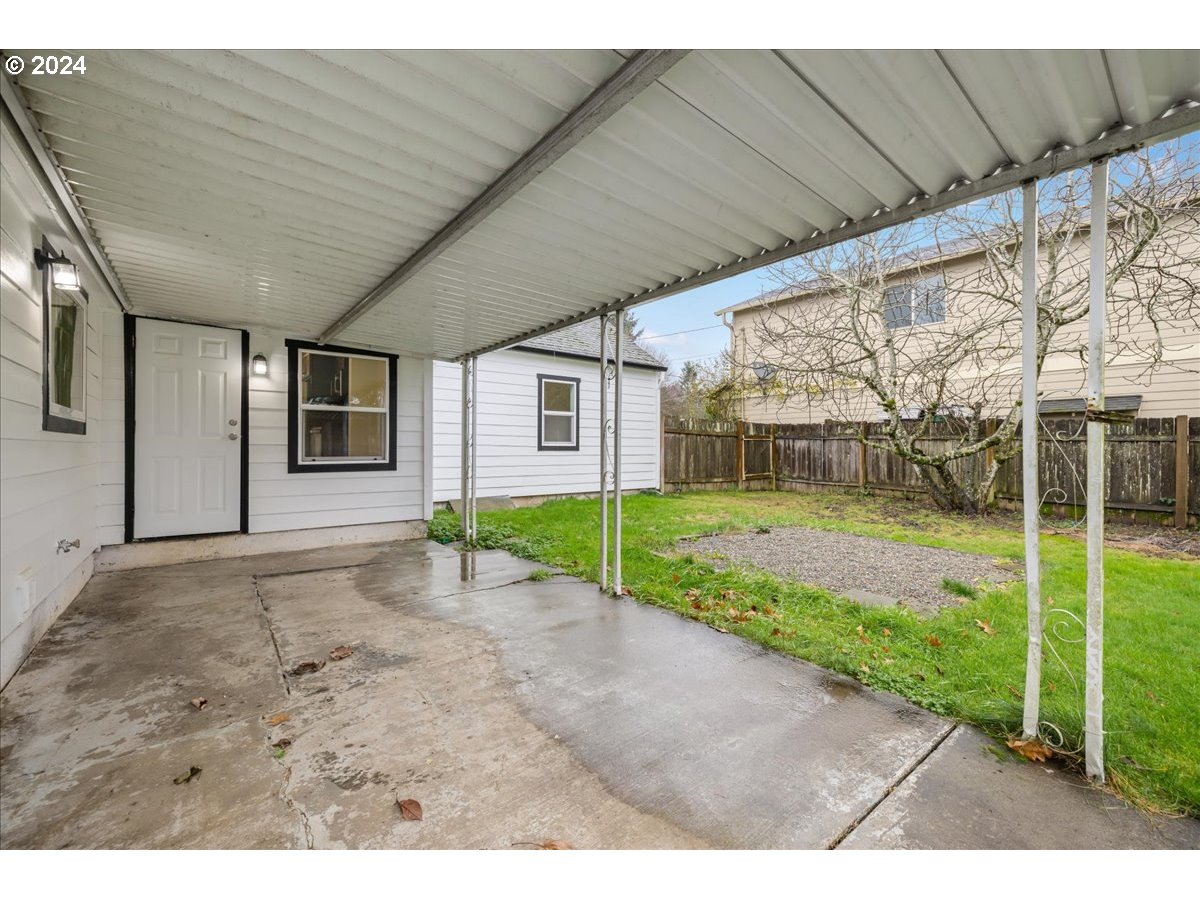 711 Southeast 5th Street Gresham, OR 97080 - Photo 37 of 44 a view of a house with backyard and porch