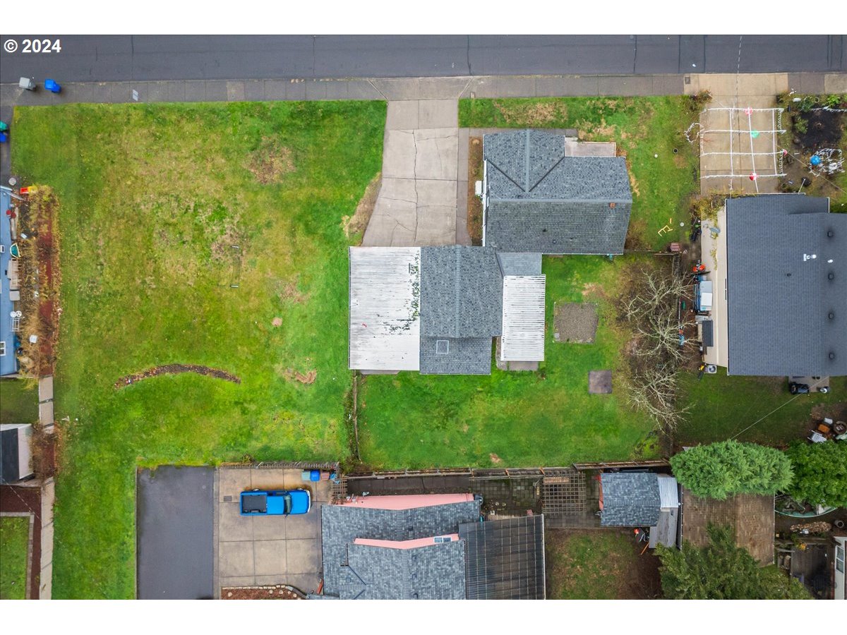 711 Southeast 5th Street Gresham, OR 97080 - Photo 41 of 44 an aerial view of a house with garden space and street view