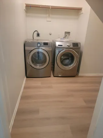 a utility room with dryer and washer