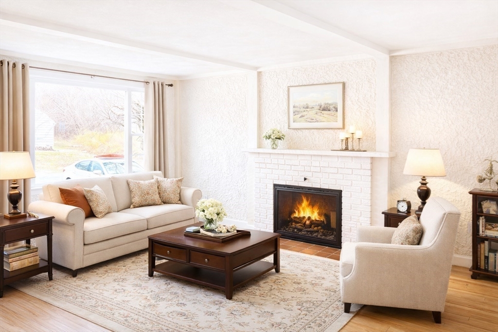 29 Forest Street Franklin, MA 02038 - Photo 13 of 19 a living room with furniture and a fireplace