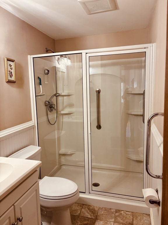 29 Forest Street Franklin, MA 02038 - Photo 14 of 19 a bathroom with a shower toilet and sink