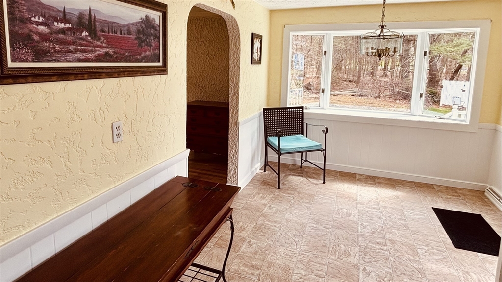 29 Forest Street Franklin, MA 02038 - Photo 8 of 19 a living room with furniture and a window