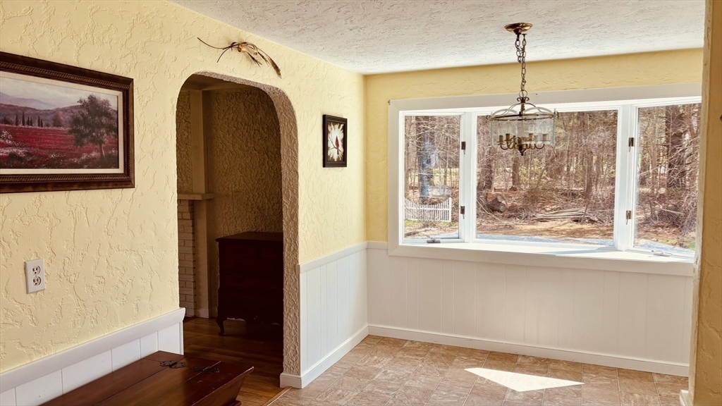 29 Forest Street Franklin, MA 02038 - Photo 9 of 19 a view of hallway with furniture and a window
