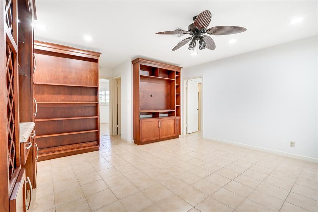 3721 Northeast 29th Avenue Lighthouse Point, FL 33064 - Photo 21 of 43 a room with window and a ceiling fan