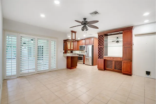 a view of kitchen with furniture and a window