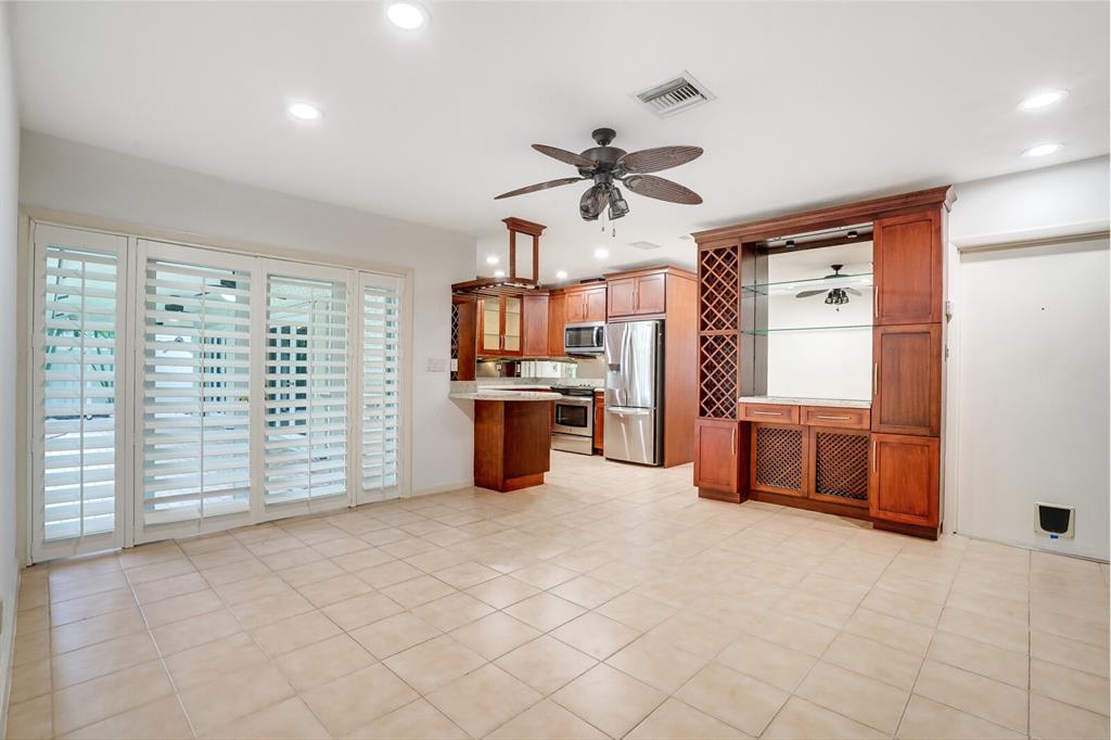 3721 Northeast 29th Avenue Lighthouse Point, FL 33064 - Photo 23 of 43 a view of kitchen with furniture and a window