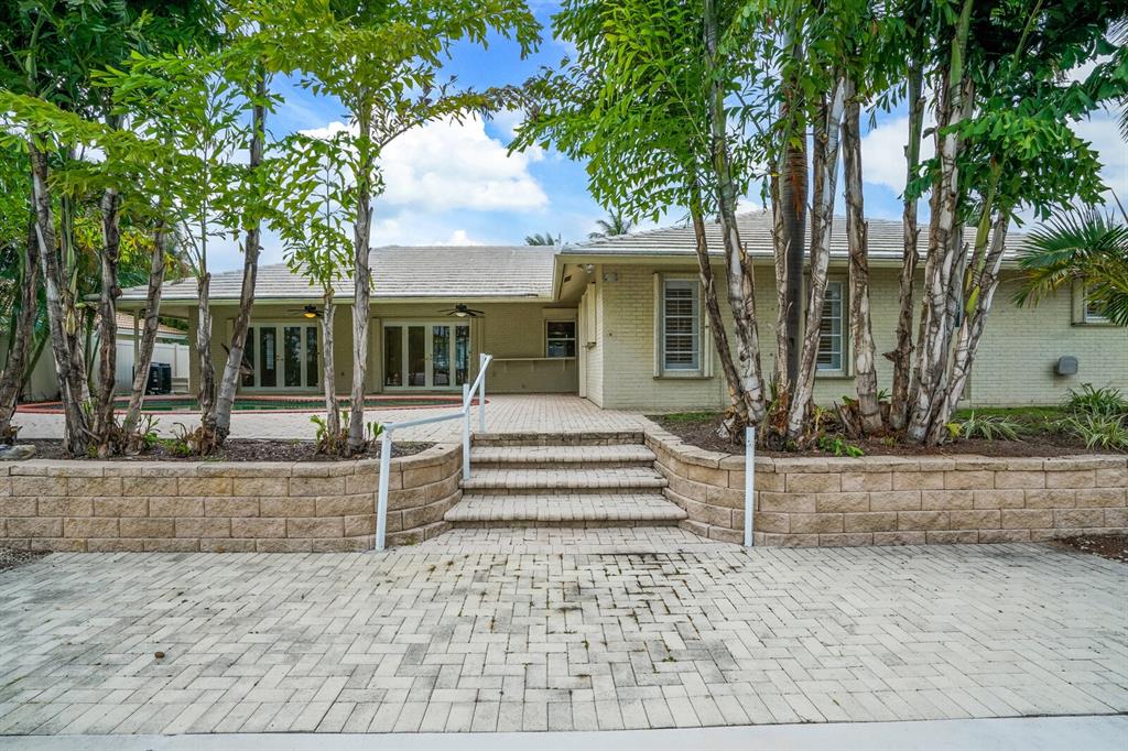 3721 Northeast 29th Avenue Lighthouse Point, FL 33064 - Photo 38 of 43 front view of a house
