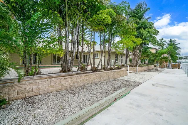 a view of a lake with a bench next to a lake