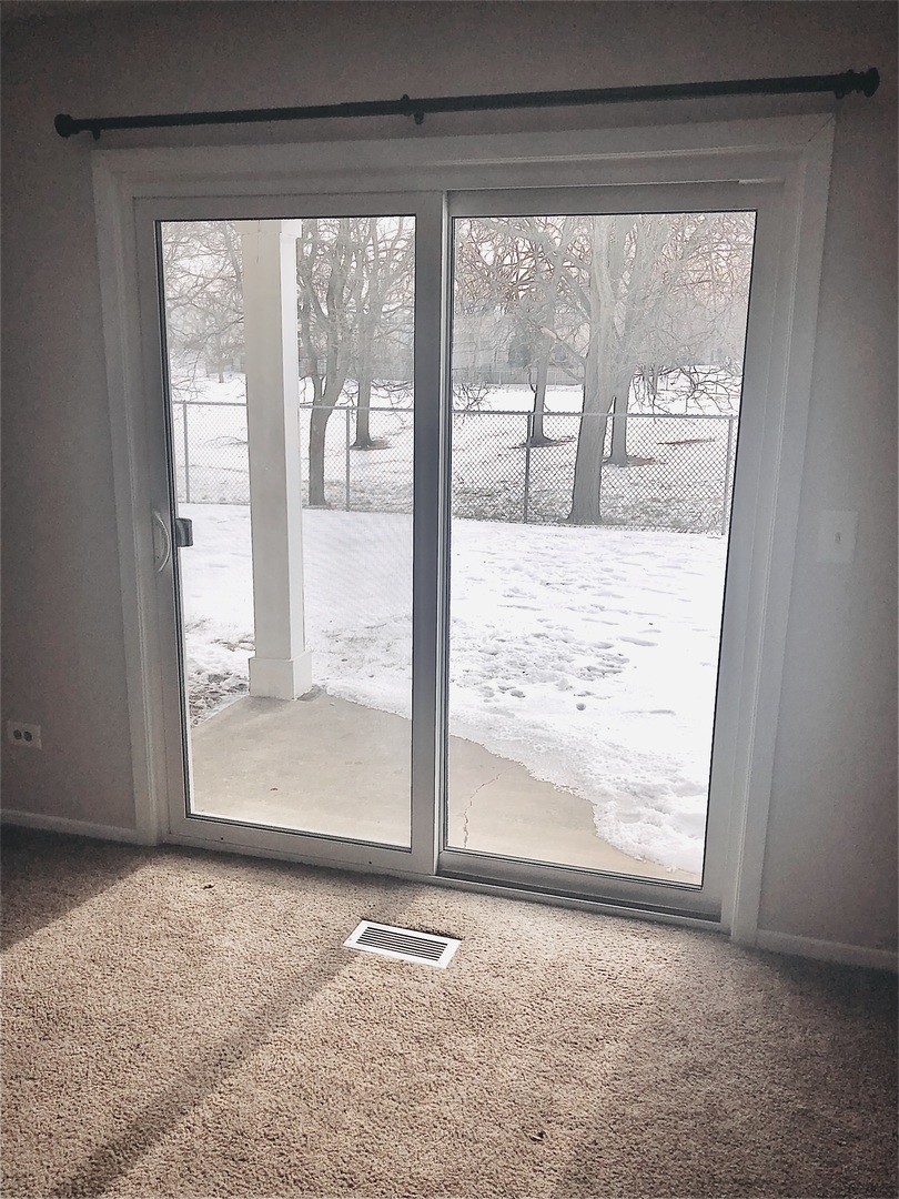 2017 Windemere Circle, Unit 2017 Schaumburg, IL 60169 - Photo 8 of 15 a view of a room with window