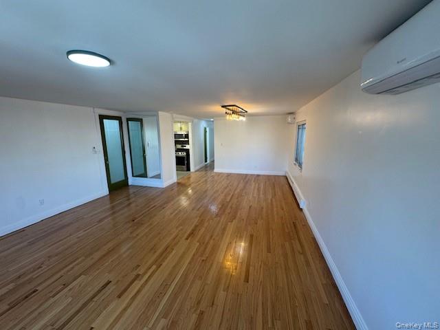103-14 169th Street Queens, NY 11433 - Photo 4 of 18 a view of livingroom with hardwood floor and window