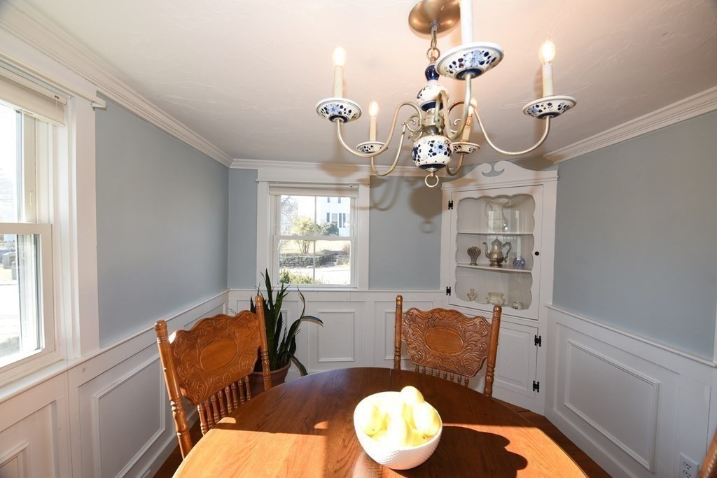 7 Summer Street Kingston, MA 02364 - Photo 11 of 41 a view of a dining room with furniture window and wooden floor