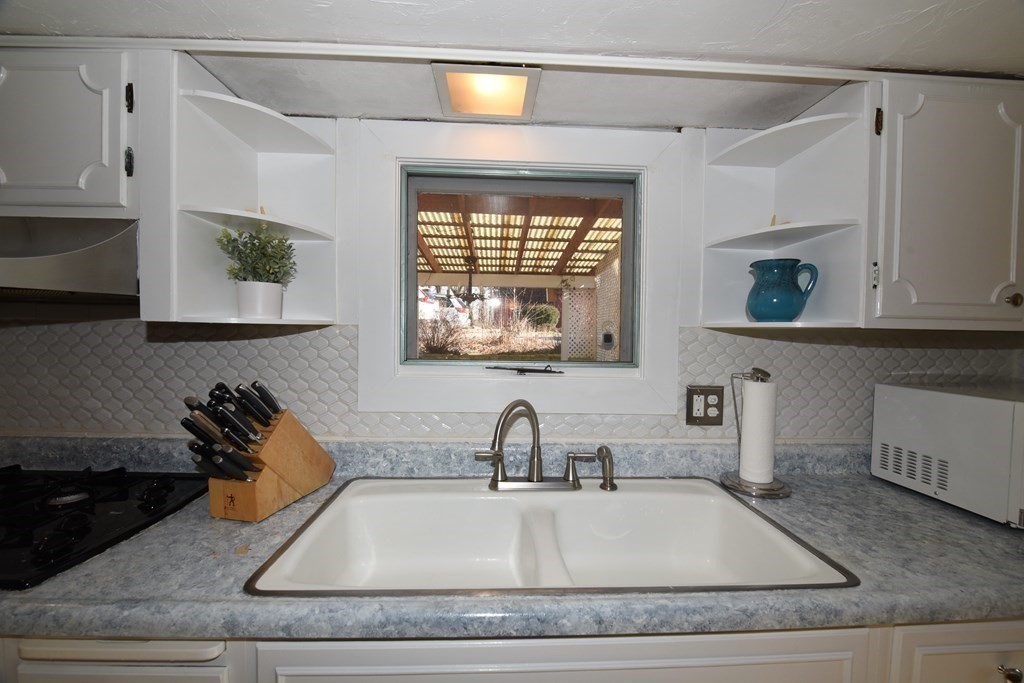 7 Summer Street Kingston, MA 02364 - Photo 18 of 41 a kitchen with sink and window