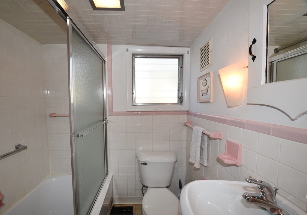 7 Summer Street Kingston, MA 02364 - Photo 20 of 41 a bathroom with a toilet sink and mirror