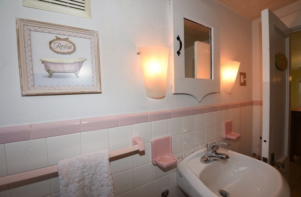 7 Summer Street Kingston, MA 02364 - Photo 21 of 41 a bathroom with a sink and a mirror