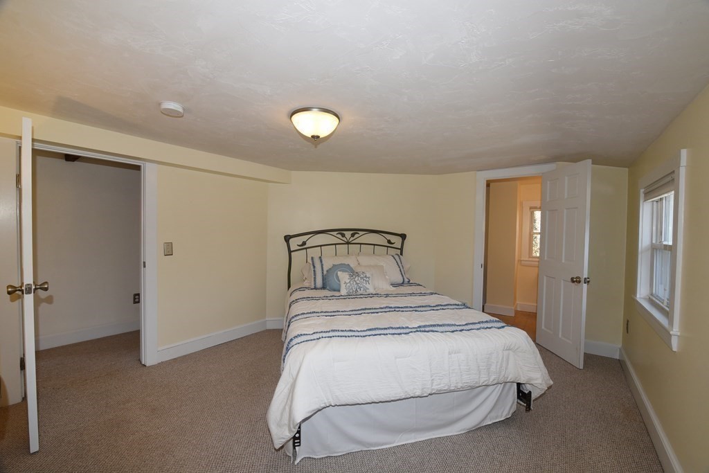 7 Summer Street Kingston, MA 02364 - Photo 22 of 41 a bedroom with a bed and closet