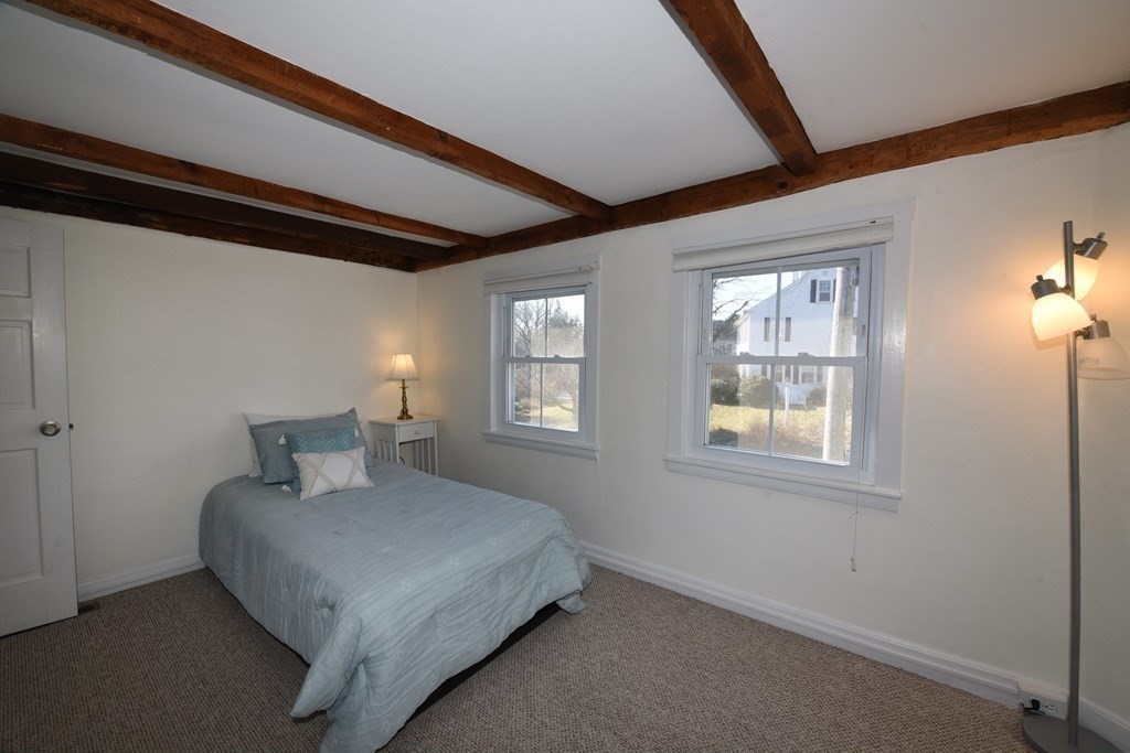 7 Summer Street Kingston, MA 02364 - Photo 30 of 41 a bedroom with a bed and window