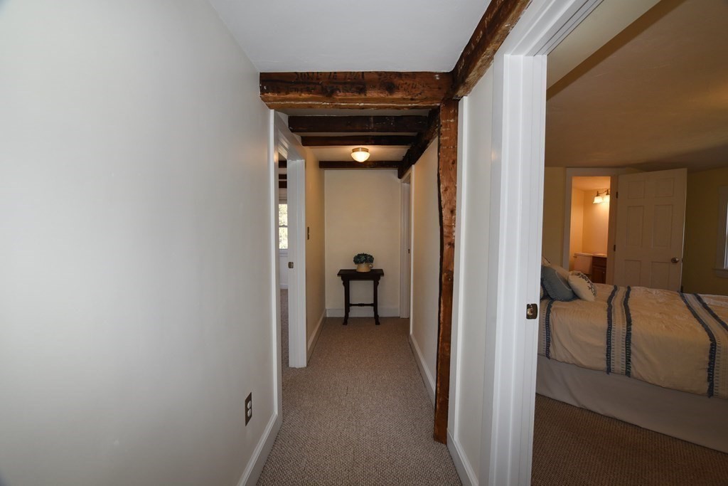 7 Summer Street Kingston, MA 02364 - Photo 32 of 41 a view of a hallway with a furniture and a hallway