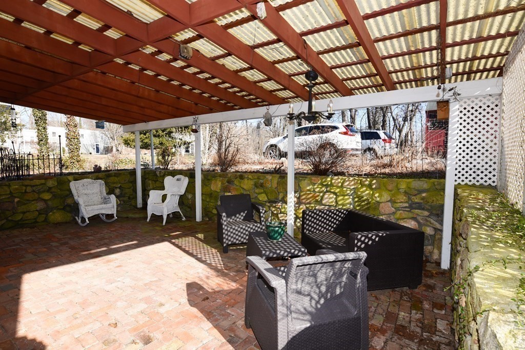 7 Summer Street Kingston, MA 02364 - Photo 33 of 41 a view of a chairs and a room in a patio