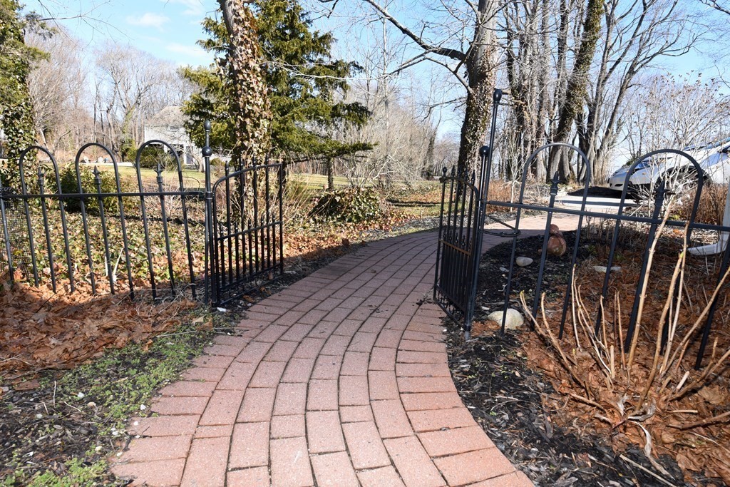 7 Summer Street Kingston, MA 02364 - Photo 37 of 41 a view of a pathway with a yard