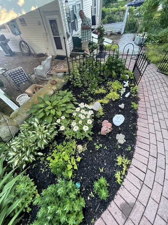 7 Summer Street Kingston, MA 02364 - Photo 40 of 41 a view of a garden with a fountain