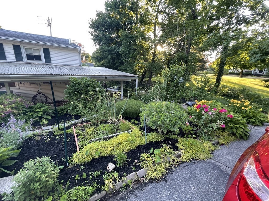 7 Summer Street Kingston, MA 02364 - Photo 41 of 41 a front view of a house with a yard