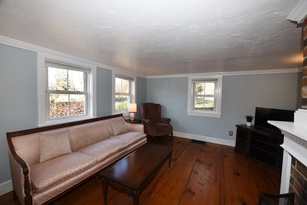 7 Summer Street Kingston, MA 02364 - Photo 8 of 41 a living room with furniture and a window