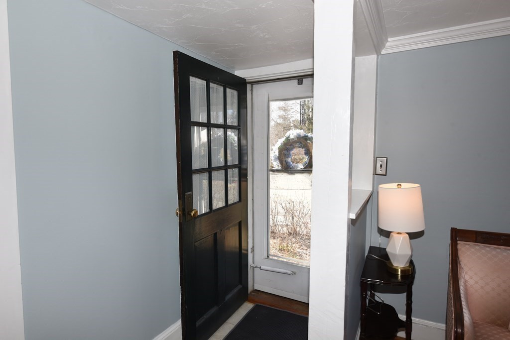 7 Summer Street Kingston, MA 02364 - Photo 9 of 41 a view of entryway with wooden floor and door