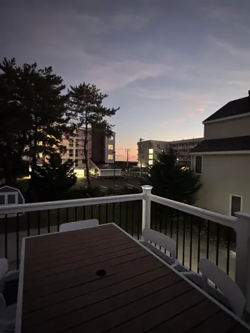 a terrace view with two chairs