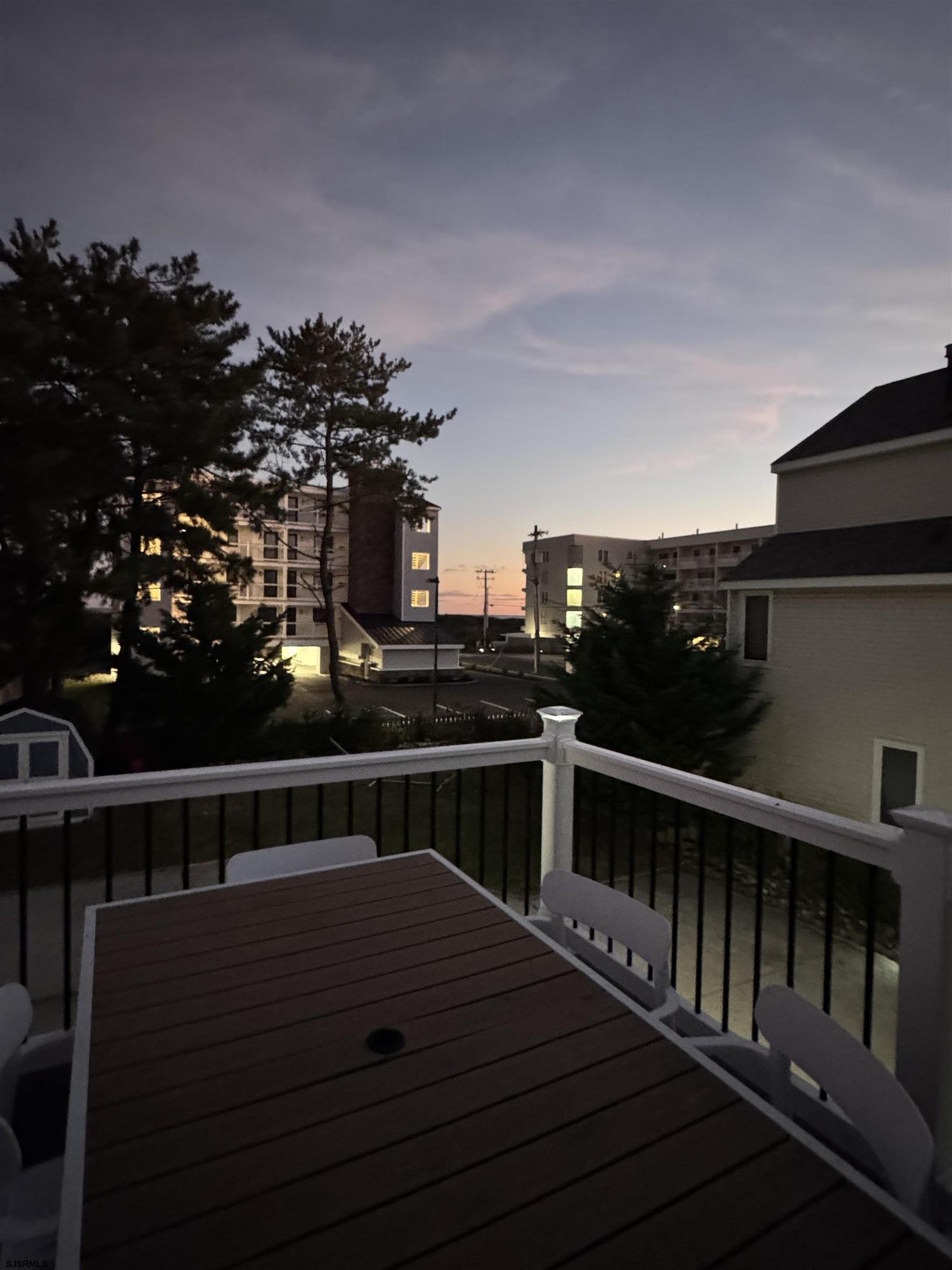 a terrace view with two chairs