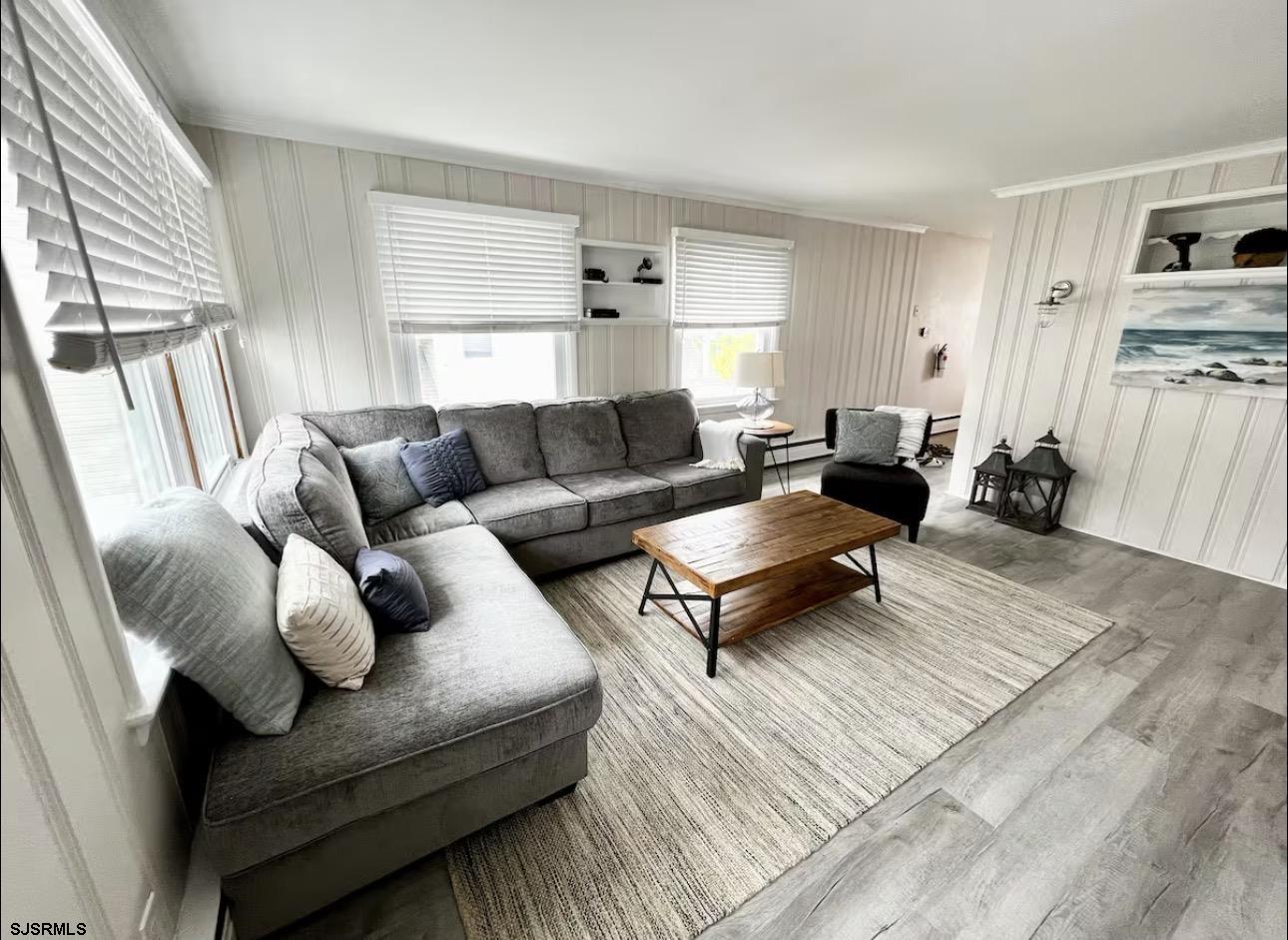 512 West Brigantine Avenue, Unit C Brigantine, NJ 08203 - Photo 4 of 19 a living room with furniture and a rug