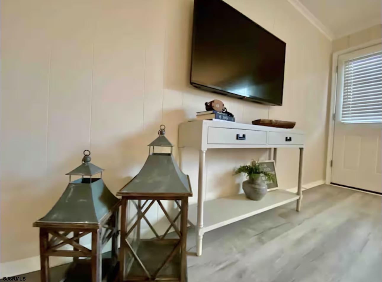 512 West Brigantine Avenue, Unit C Brigantine, NJ 08203 - Photo 5 of 19 a living room with furniture and a flat screen tv