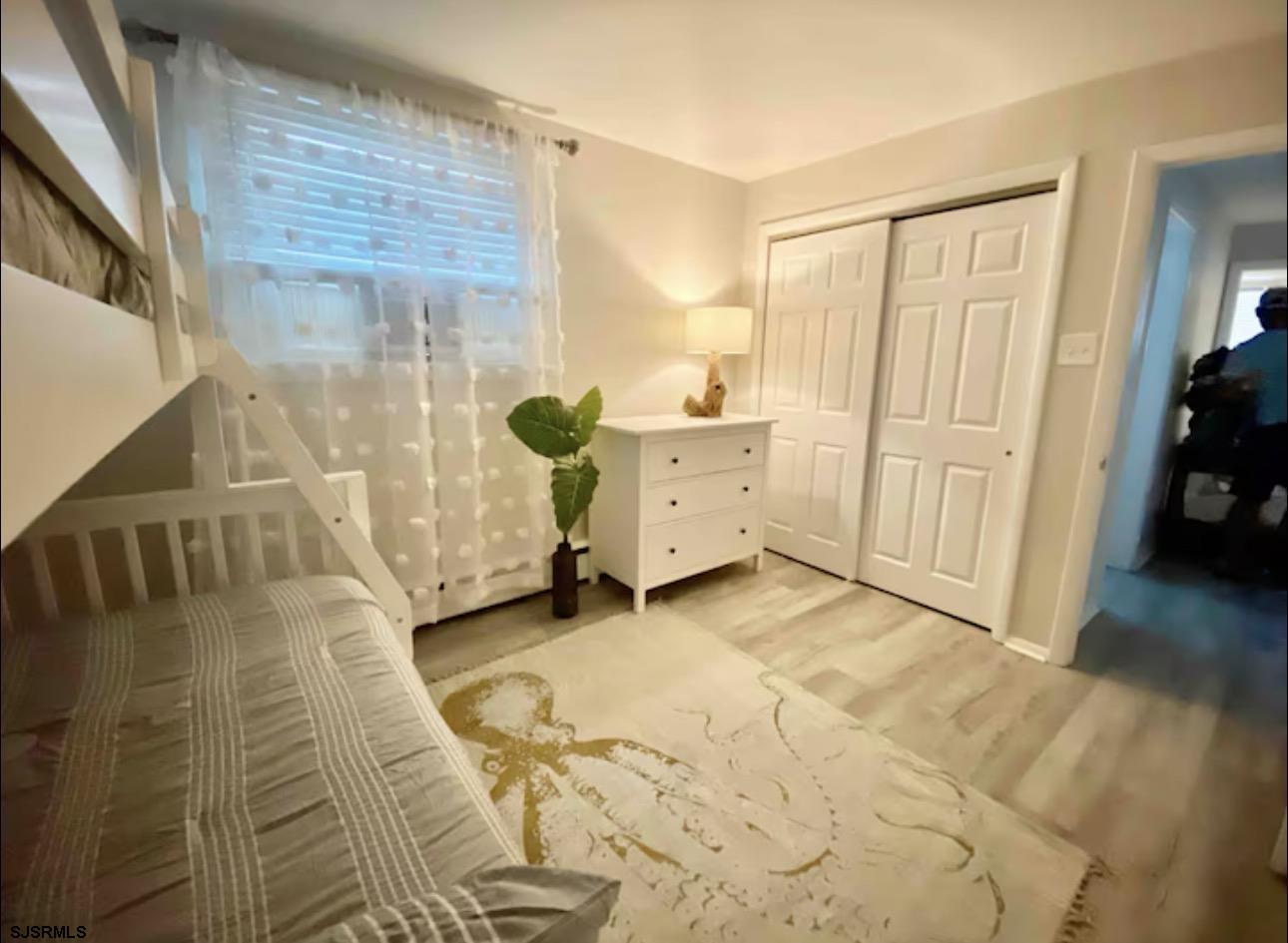 512 West Brigantine Avenue, Unit C Brigantine, NJ 08203 - Photo 9 of 19 a view of a bedroom with closet