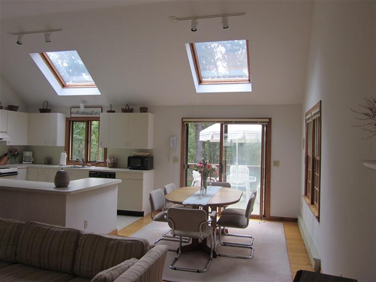 64 Day Road Wellfleet, MA 02667 - Photo 13 of 24 a view of a dining room with furniture window and outside view