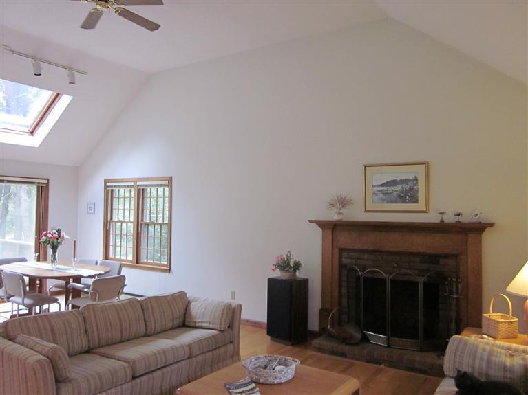 64 Day Road Wellfleet, MA 02667 - Photo 14 of 24 a living room with furniture and a fireplace