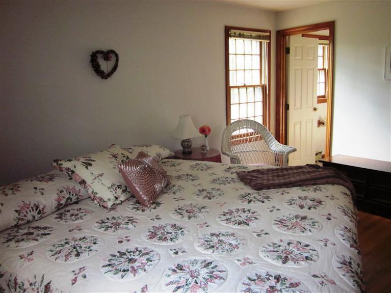 64 Day Road Wellfleet, MA 02667 - Photo 16 of 24 a bedroom with a bed and window