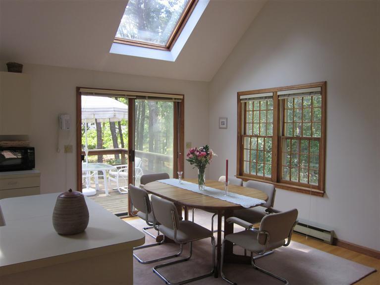 64 Day Road Wellfleet, MA 02667 - Photo 4 of 24 a view of a dining room with furniture window and outside view