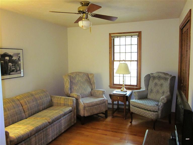 64 Day Road Wellfleet, MA 02667 - Photo 9 of 24 a living room with furniture and a window