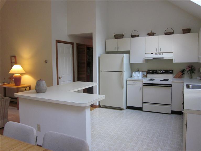 64 Day Road Wellfleet, MA 02667 - Photo 10 of 24 a utility room with cabinets washer and dryer