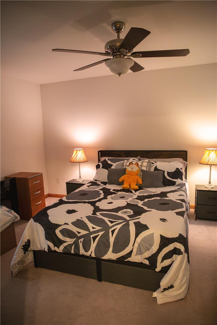50 Anthony's Road White Haven, PA 18661 - Photo 31 of 57 a bedroom with a bed and a chandelier